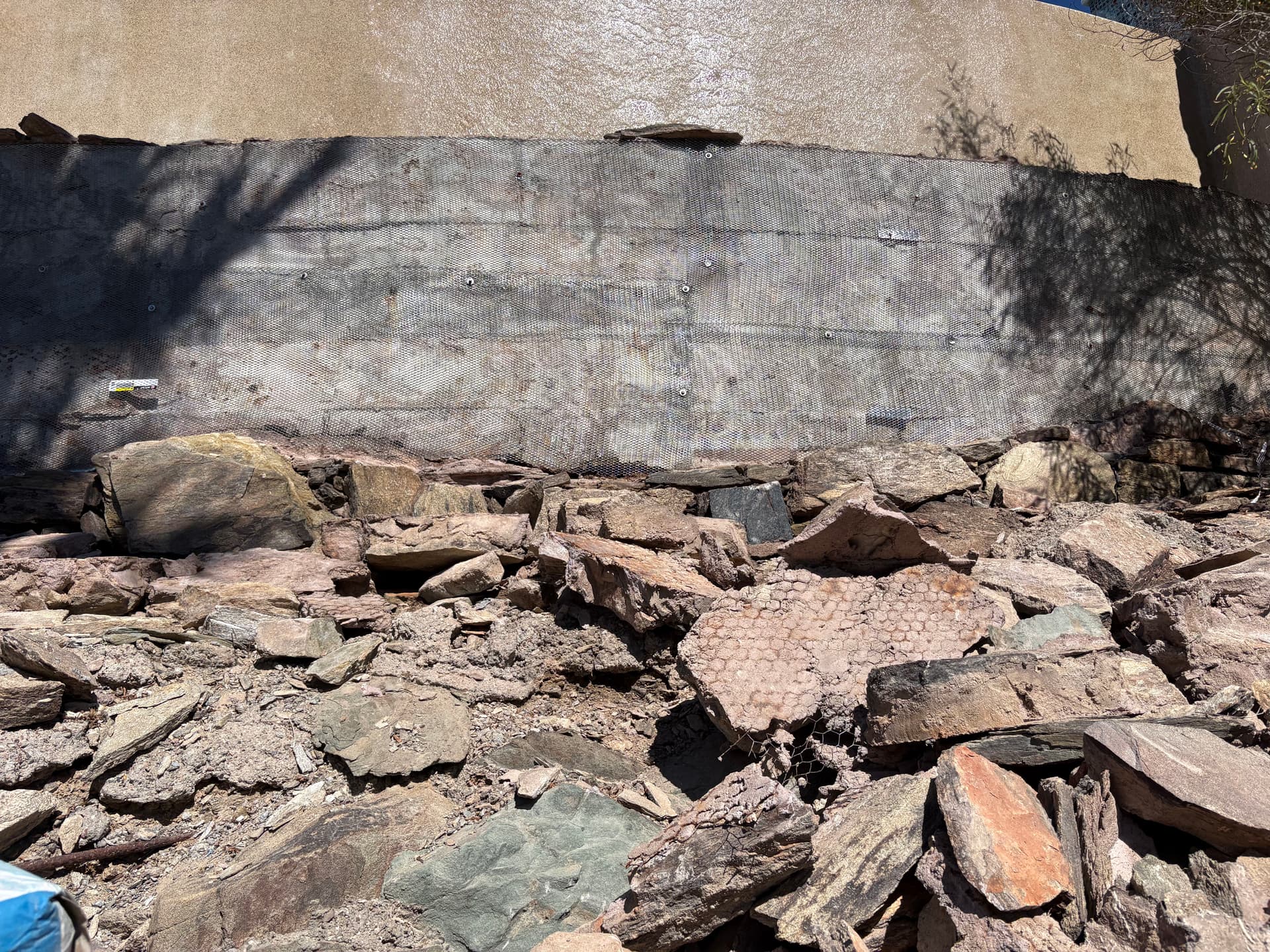 Gallery photos for Failing Faux Stone Wall Stripped Down and Rebuilt Right: Image #3