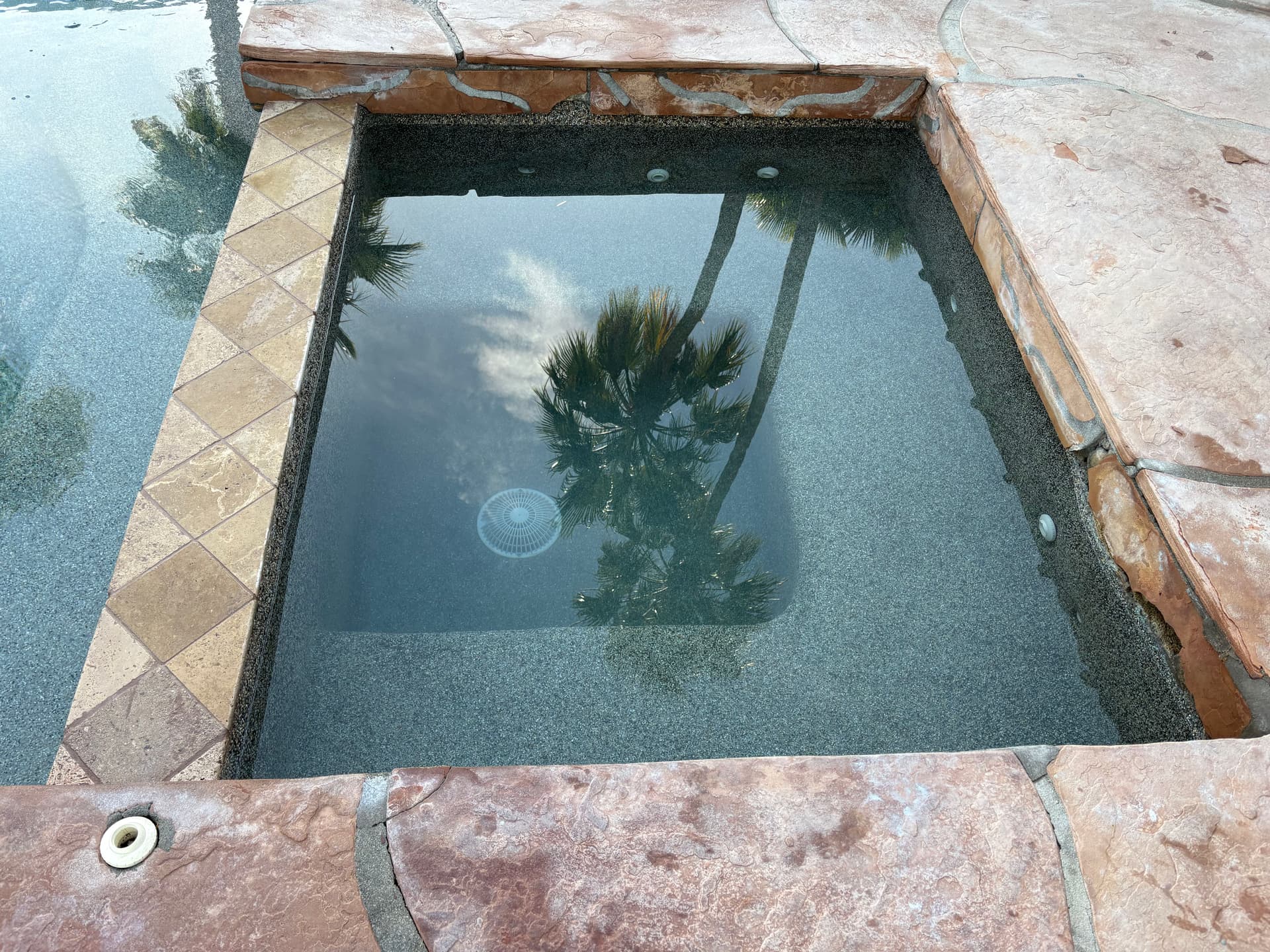 Gallery photos for Spa Pebble Patch, Spillway Tile Replacement and Main Drain Cover Swap: Image #6
