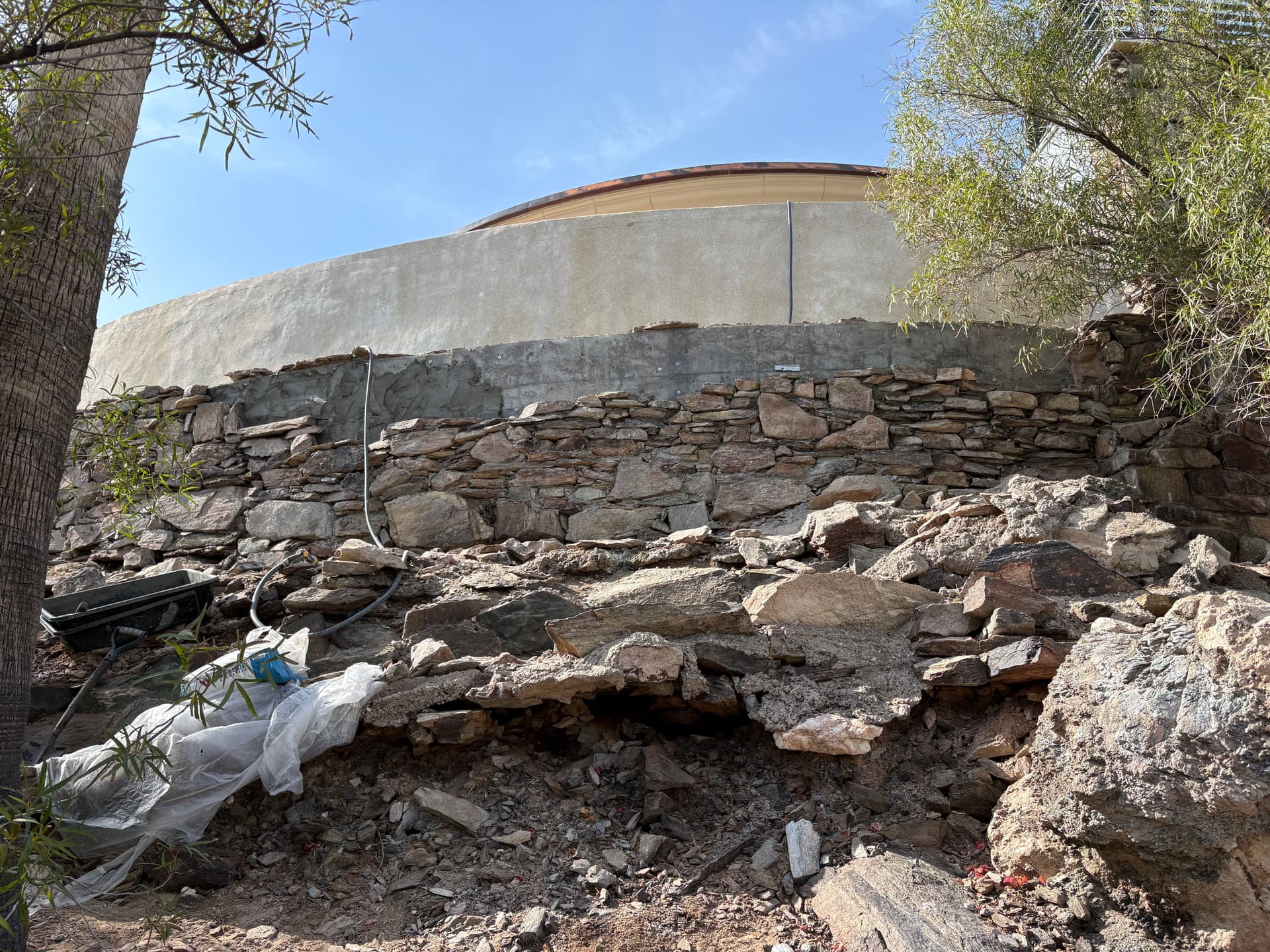 Gallery photos for Failing Faux Stone Wall Stripped Down and Rebuilt Right: Image #5