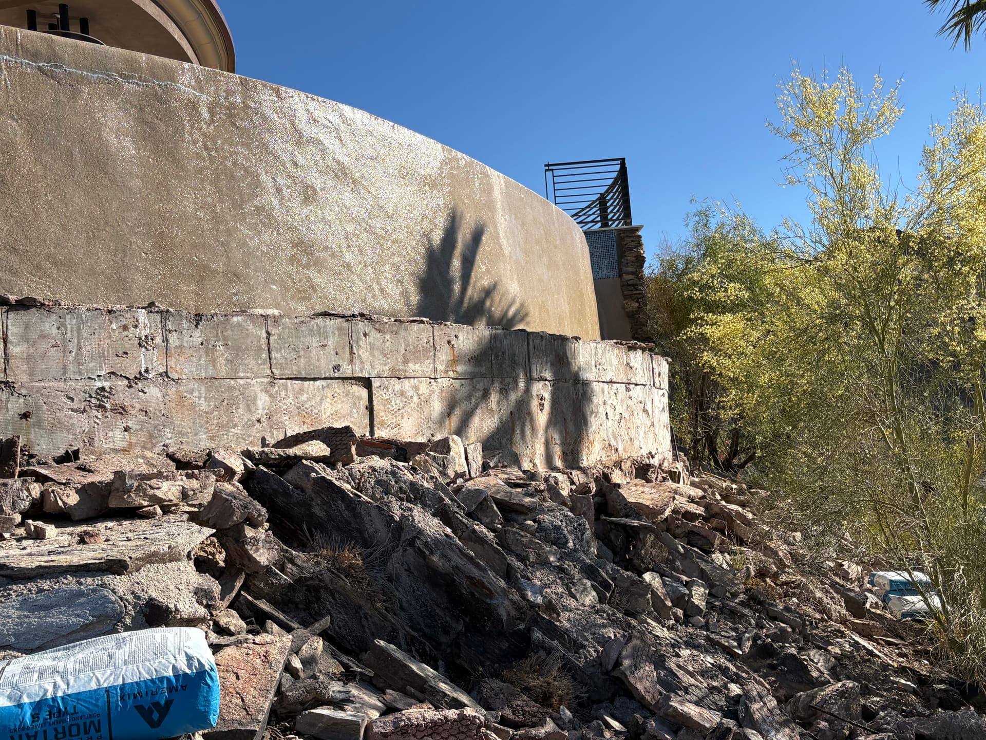 Gallery photos for Failing Faux Stone Wall Stripped Down and Rebuilt Right: Image #2