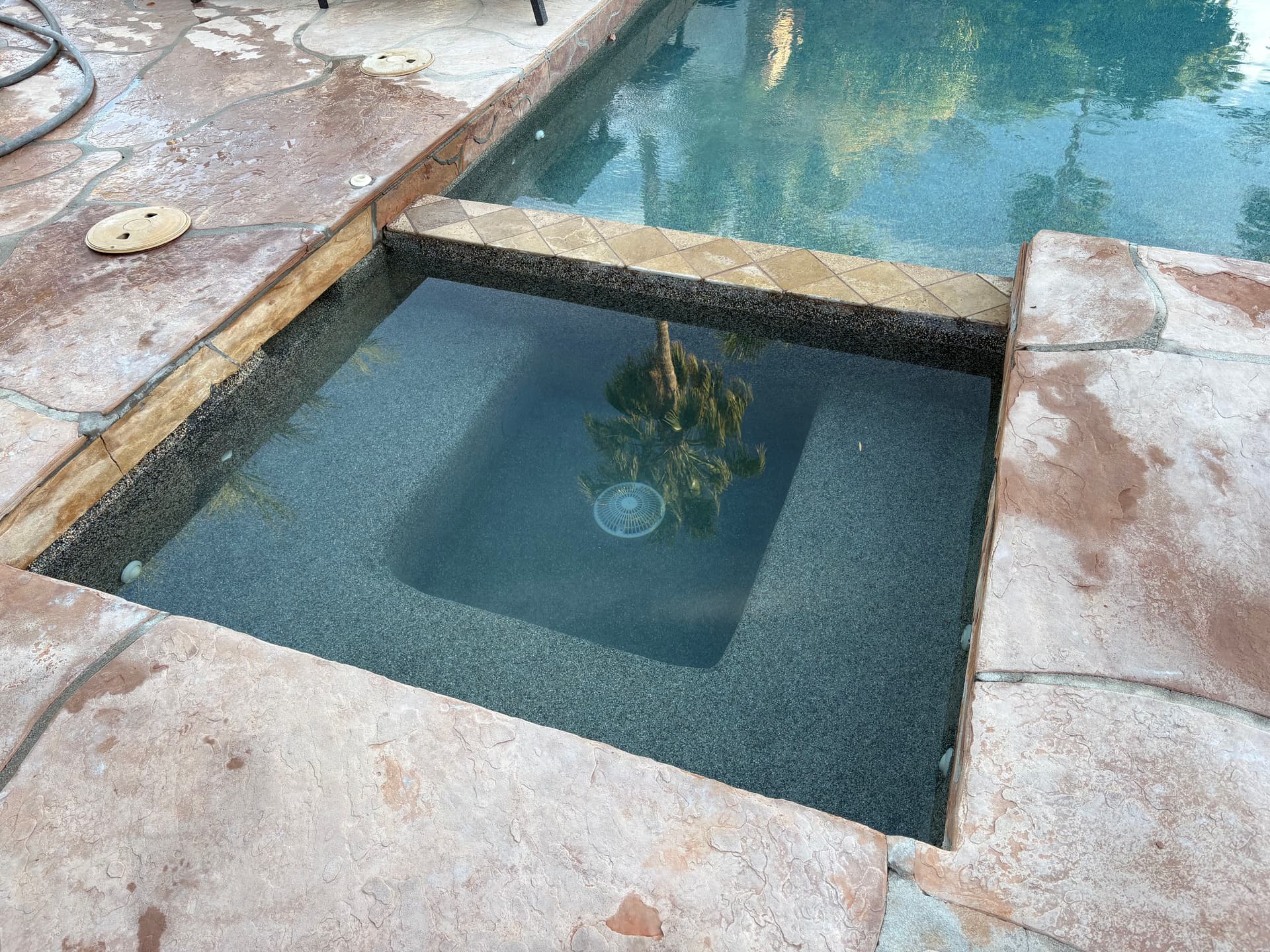 Gallery photos for Spa Pebble Patch, Spillway Tile Replacement and Main Drain Cover Swap: Image #4