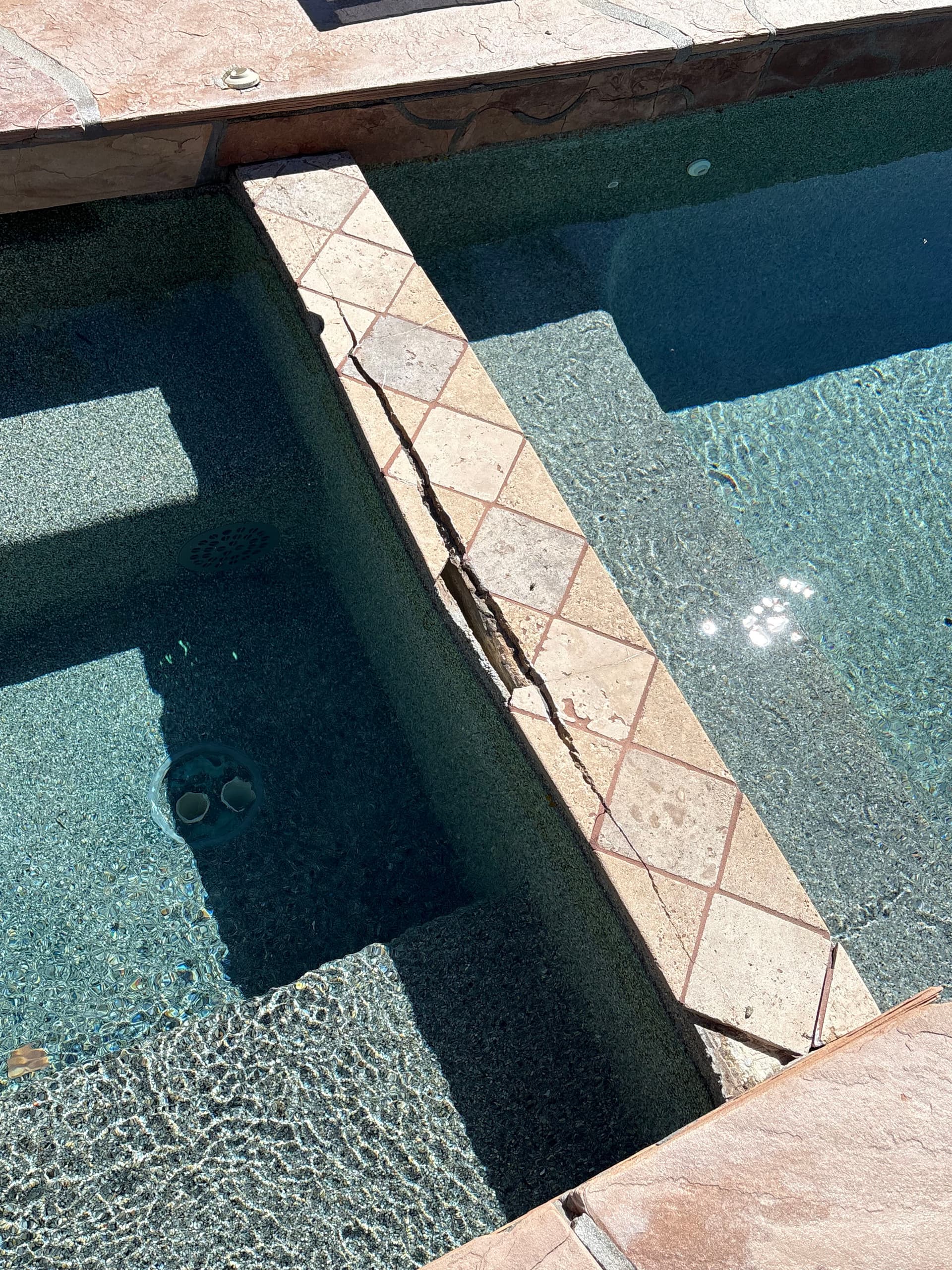 Gallery photos for Spa Pebble Patch, Spillway Tile Replacement and Main Drain Cover Swap: Image #1